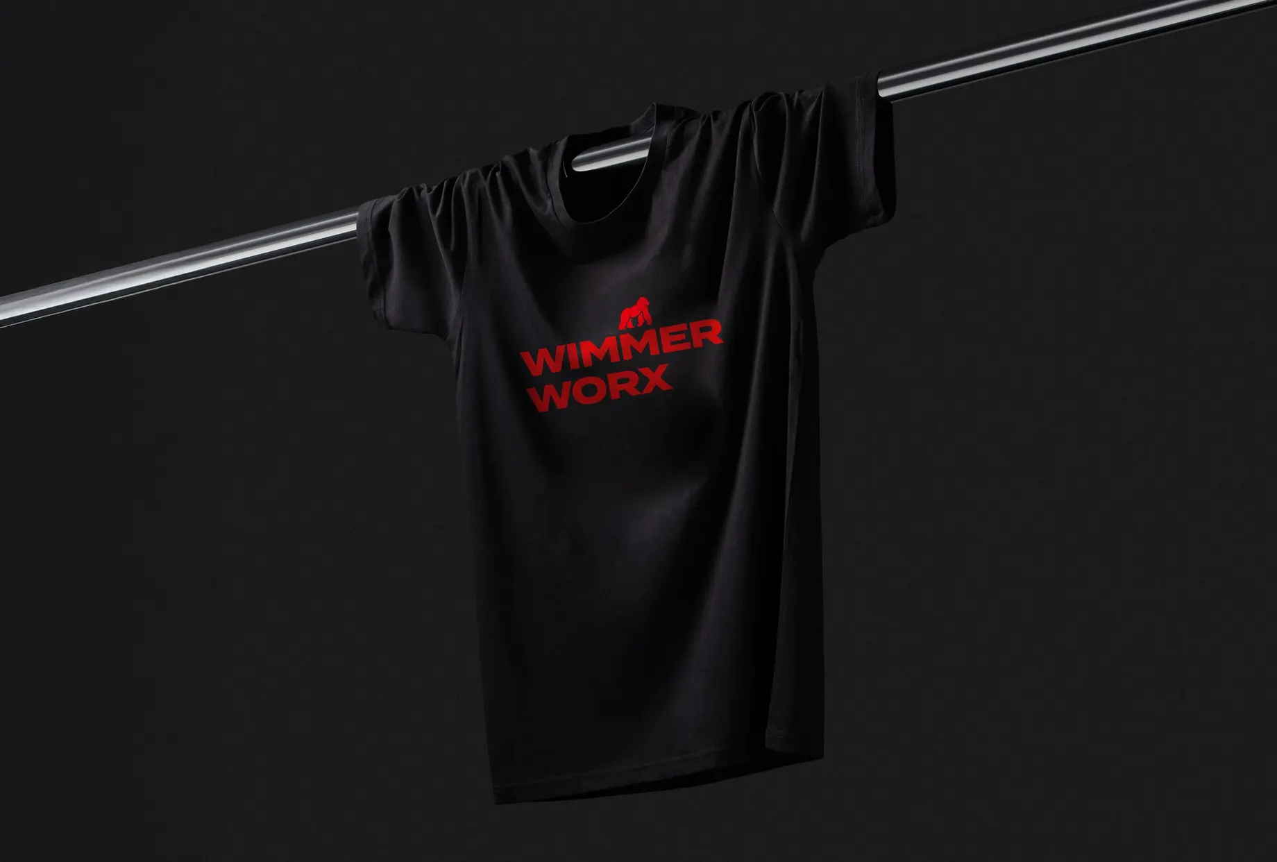 Anwendung des neuen Brand Designs auf Visitenkarten, Briefpapier und Werbematerialien für den Wimmer Holzbau-Shop.